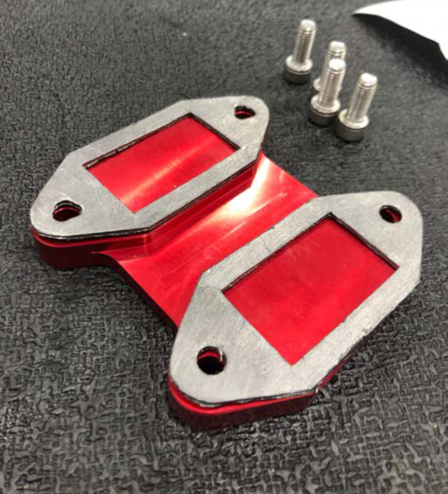 Fit both new gaskets and the anodised aluminium plate