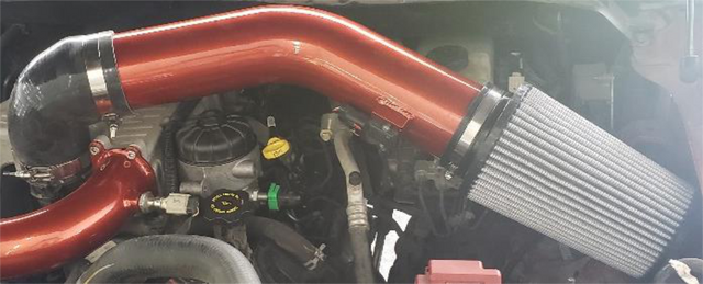 Move the MAF and compressor inlet sensors to the new duct, and fit the filter
