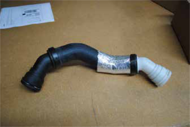 Remove the upper radiator hose from the thermostat housing