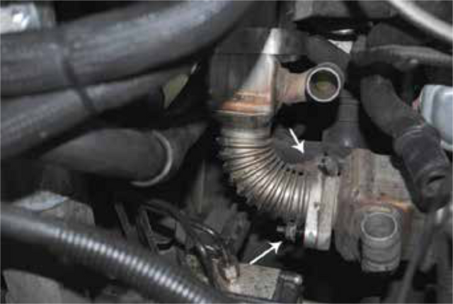Disconnect the vertical EGR cooler's coolant lines and separate the two coolers