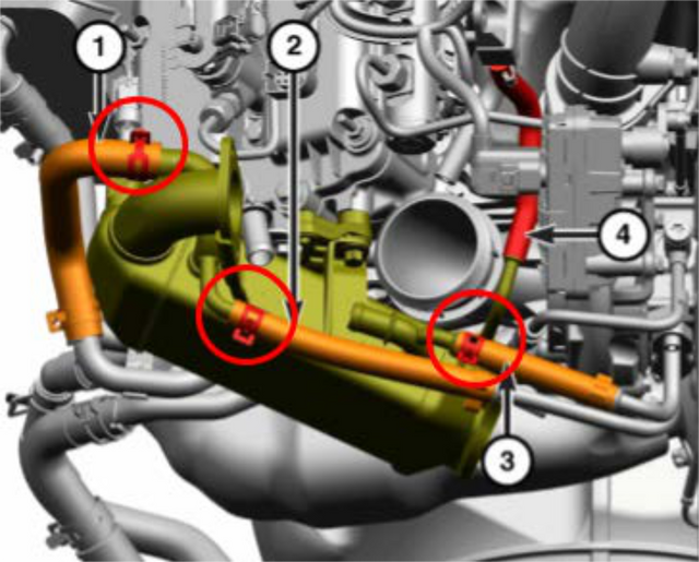 Remove the remaining coolant hoses, the spacer bracket and the actuator