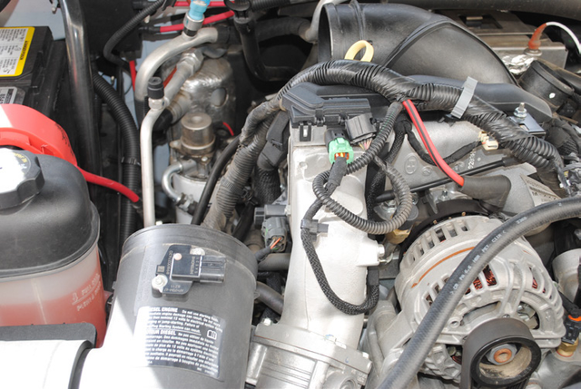 Disconnect the charge-back wire on the alternator