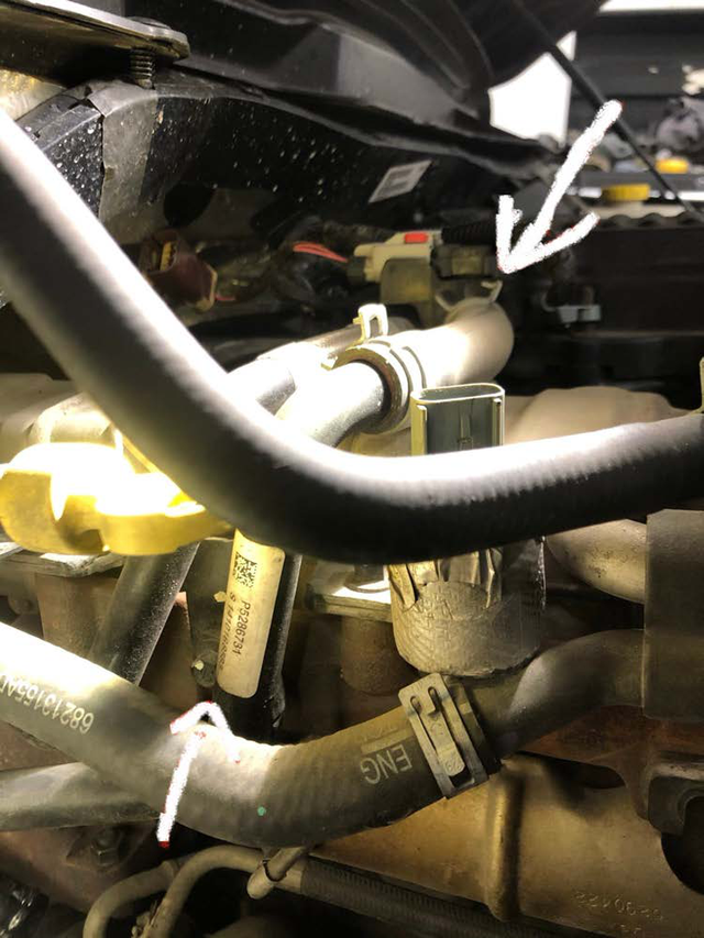 Remove the V-band clamp you loosened earlier