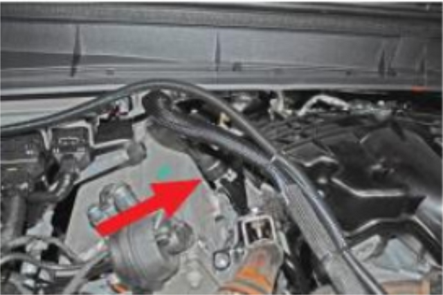 Disconnect the quick-connect coolant line from the metal standpipe