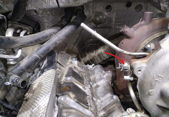 Cap the unused port on the turbo coolant supply line