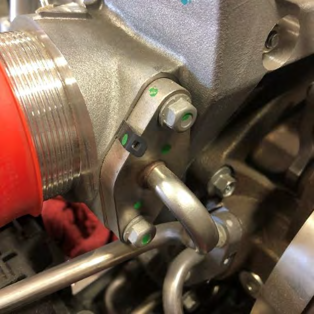 Refit the turbo coolant feed and return lines