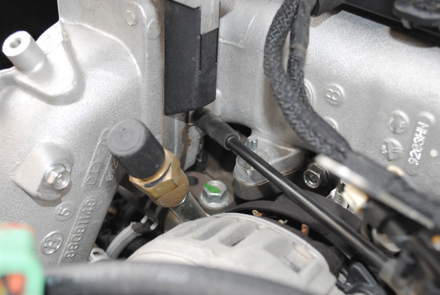 Remove the small tube on the cast intake