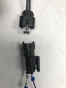 Pin the switch wires into the supplied plug