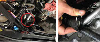 Remove the passenger side coolant hardline