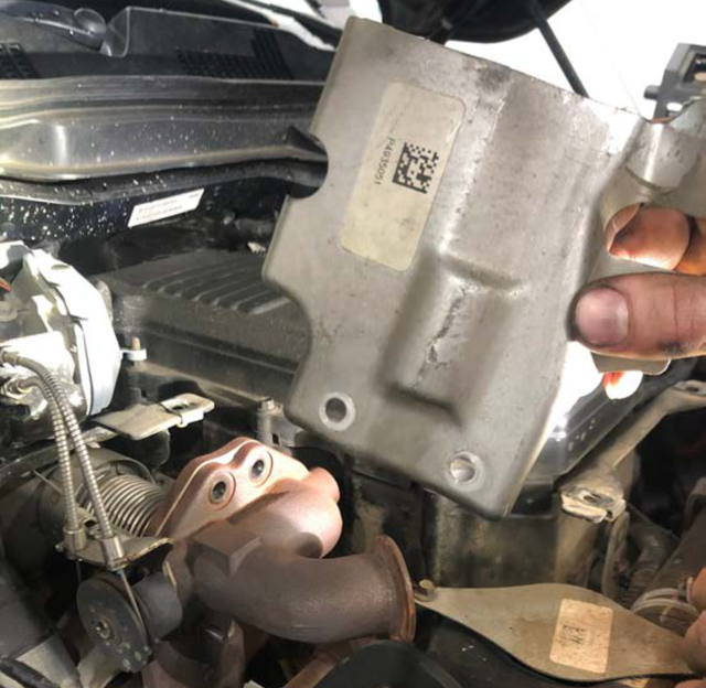 Remove the remaining heat shield bolts