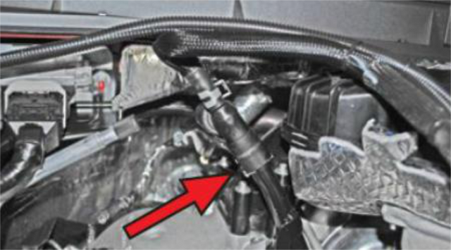 Disconnect the quick-connect coolant line from the metal standpipe