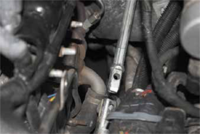 Remove the steering shaft bolt and slide the stem up and out of the steering box shaft