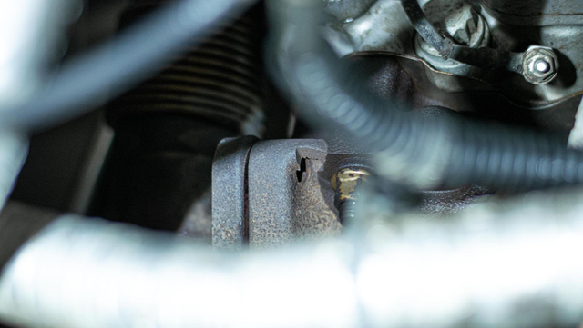 Remove the up-pipe bolts at the turbo