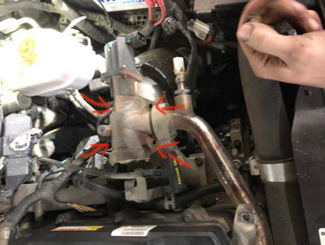 Unbolt the EGR valve from the intake horn