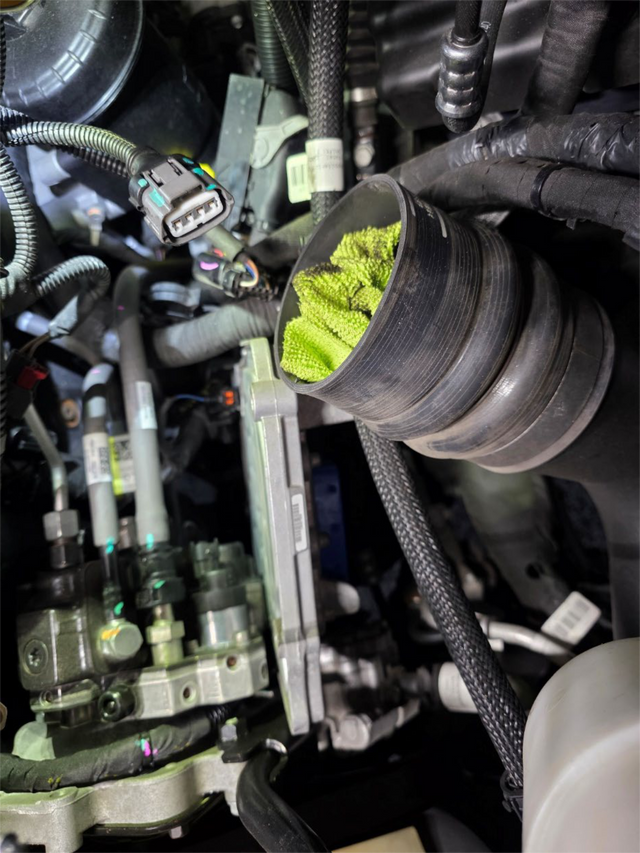 Disconnect the ECM connectors and unbolt the ECM