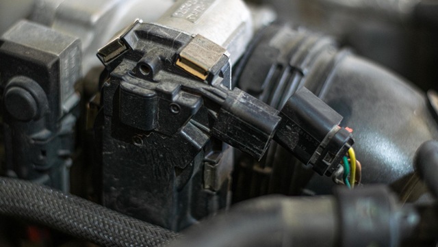 Disconnect the connectors on top of the motor