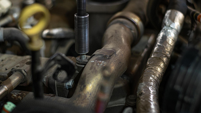 Remove the EGR bypass pipe