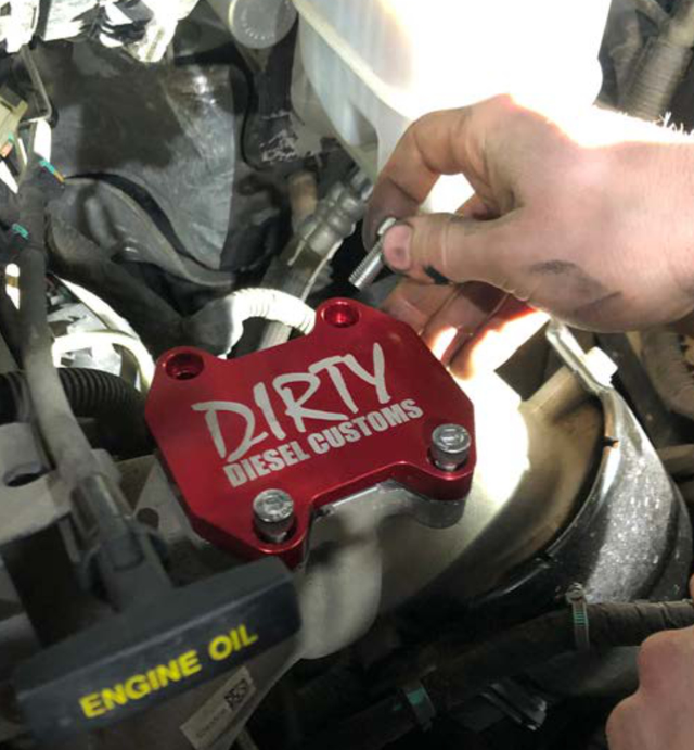 Torque the intake horn plate to 18 ft-lb
