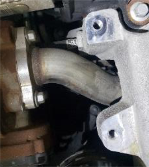 Unbolt the charge tube