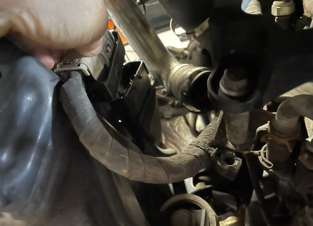 Disconnect the throttle valve, EGR and DEF components