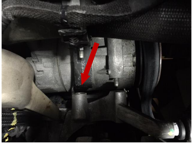 Remove the upper radiator hose mount