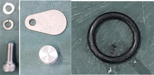 Remove the small black tube and fit the blocker plate