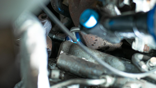 Remove the up-pipe bolts at the turbo