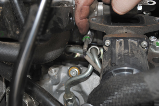 Remove the two temperature sensors from the EGR cooler