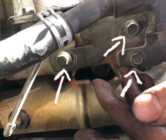 Remove the three bolts on the other side of the EGR cooler