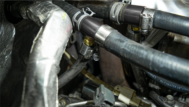 Install the coolant re-route kit