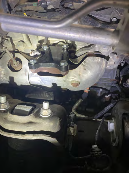 Install the steel manifold block off plate