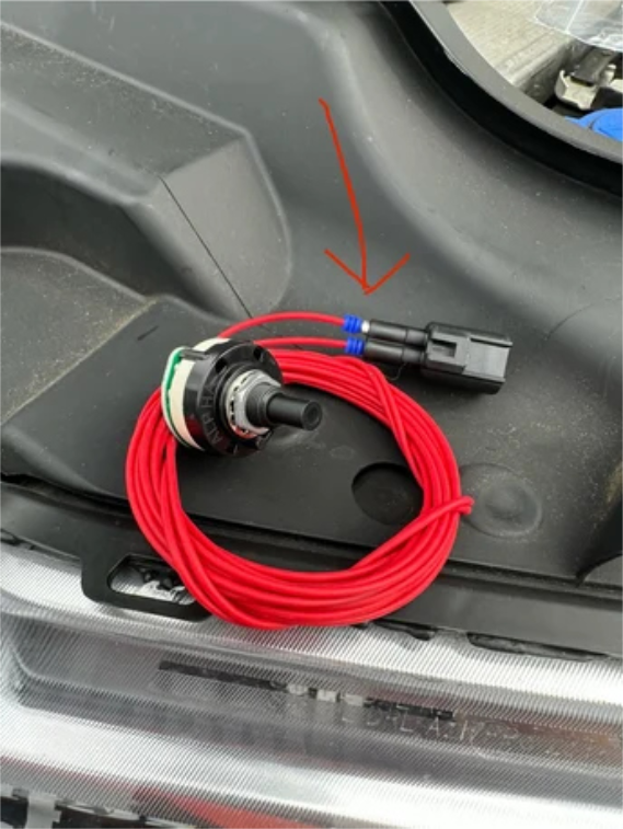 Disconnect the factory harness from the charge air temperature sensor