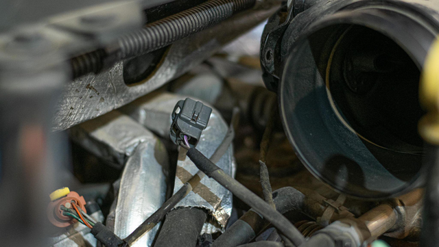 Disconnect the two connectors on the turbo air intake pipe