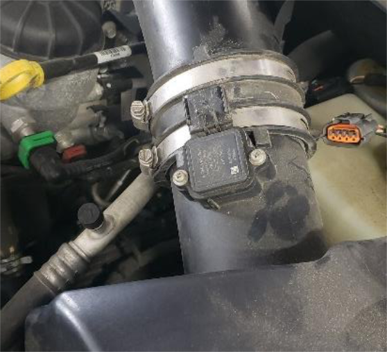 Move the MAF and compressor inlet sensors to the new duct, and fit the filter