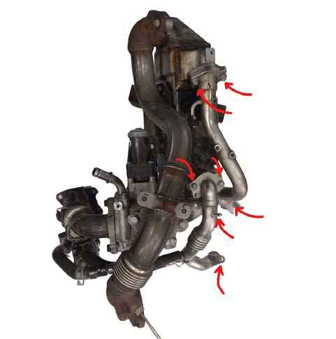 Remove the two large steel coolant pipes feeding the EGR cooler