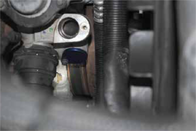 Install the second coolant plug