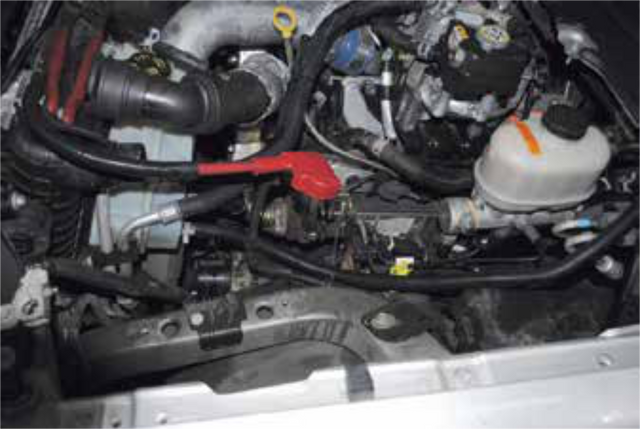 Remove the battery tray and degas bottle